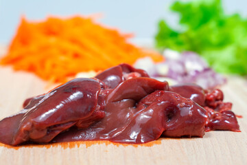 raw chicken liver and vegetables