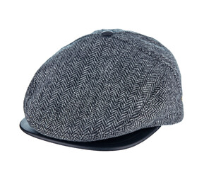 Beautiful tweed cap made of grey wool with a leather visor isolated on a white background. Sample of men's style.