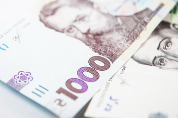 Different paper banknotes Ukraine background