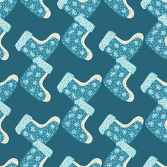 Winter seamless cozy pattern with knitted gift socks elements. Blue palette xmas backdrop.