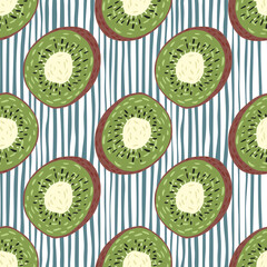 Seamless pattern in abstract style with kiwi doodle slice ornament. Blue and white striped background.