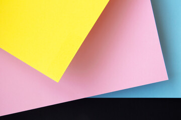 Abstraction from multicolored paper backgrounds with contrasting shadows