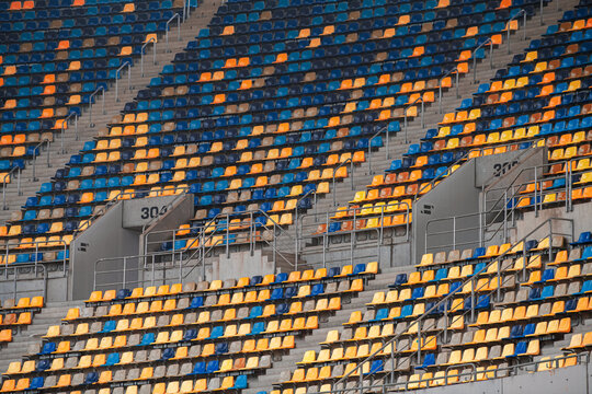 Empty football sport stadium seats during coronavirus pandemic without people
