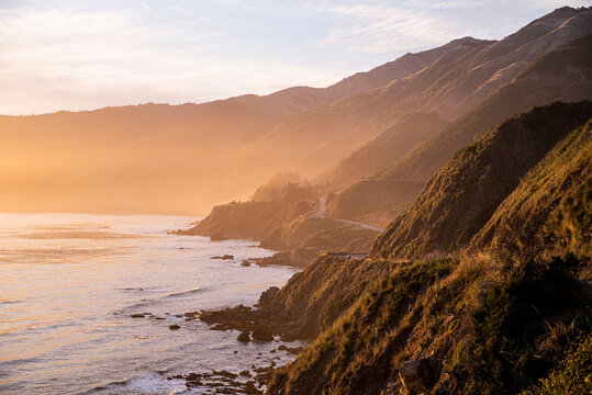 golden glow of sunset along big sur california 