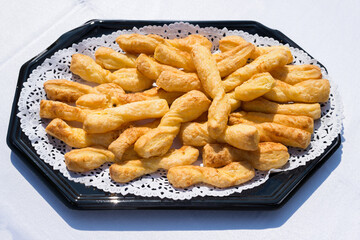 The buffet at the reception. Closeup of saltine crackers. Party catering.