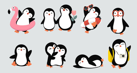 Cute hand drawn  little penguins poses vector collection © focus_bell