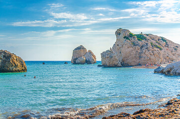 Aphrodite Beach with Stone Rocks in Aphrodite bay of Mediterranean sea water, blue sky in sunny day...