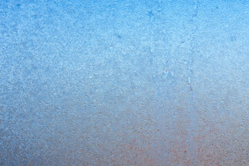 Beautiful natural background or texture of frozen transparent glass on the window in winter, strong cold concept, horizontal image, copy space for your design or text