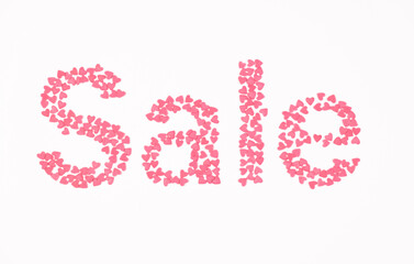 Sale, pink hearts on white background top view