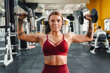 Woman fitness coach making sport exercise for arms