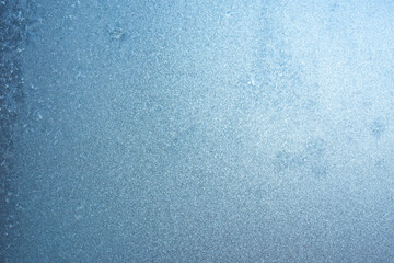 Winter frozen background, beautiful texture of frozen glass in winter, negative air temperature