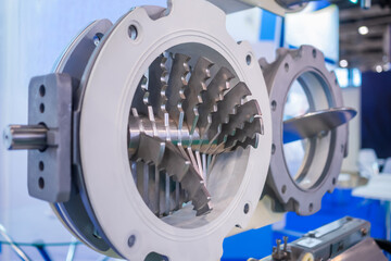 Lump breaking feeder valve for breaking up friable lumps in bulk materials such as sugar, salt, silicates, chemicals, and food products at exhibition, trade show - close up