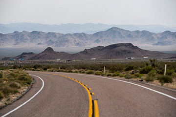 road leading through the Mojave desert in california