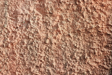 Texture of decorative interior yellow plaster