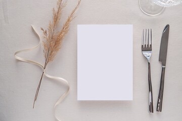 Menu mockup on table, blank card for wedding, restaurant, festive dinner menu design.