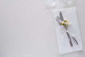 Wedding table mockup, white wedding background and festive table setting, place for text or menu design.