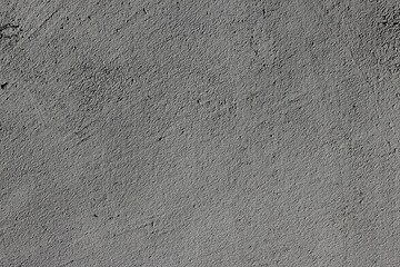 Gray scratched cement texture on the wall