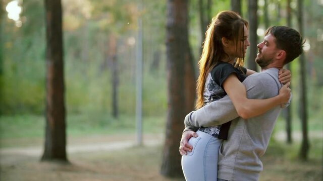 The man raised his girlfriend and&nbsp;hugs&nbsp;her