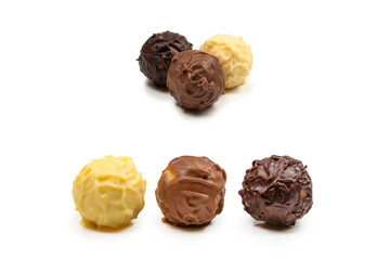 Chocolate truffle isolated on white background.