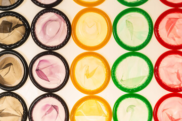 Obraz na płótnie Canvas Colorful condoms background.