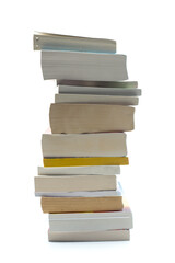 Closeup of books pile on white background