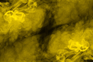 Obraz na płótnie Canvas Yellow steam on a black background.