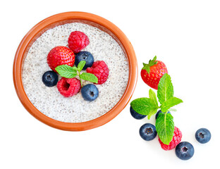 Chia seed pudding  with fruits and  berries isolated on white background. Chia seeds Yogurt. Top view.