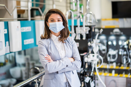 Confident Businesswoman Standing In Her Store. Small Business Owner Posing In Her Store, Wearing Protective Face Mask.