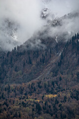 Winter mountains in the clouds. Beautiful mountain landscape