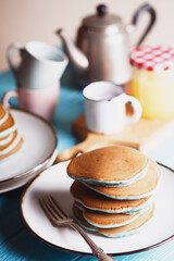 Stack pancakes with philadelphia cheese and blueberries