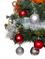 Decorative glass white, golden, and red glittering ball ornaments and white, golden, tinsel, garland on Christmas tree. Isolated on white background. Winter holiday decoration concept