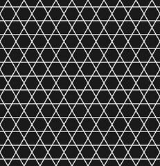 Geometric seamless pattern with hexagons and triangles in black and white