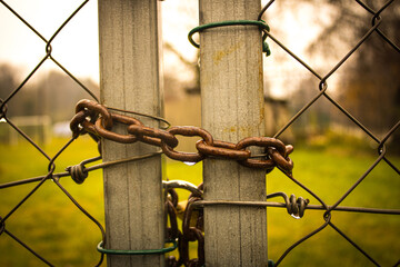 abandoned zone with rusty chain and padlock