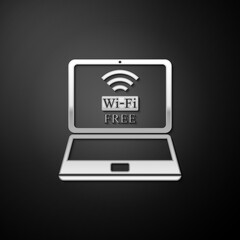 Silver Laptop and free wi-fi wireless connection icon isolated on black background. Wireless technology, wi-fi connection, network, hotspot concepts. Long shadow style. Vector.