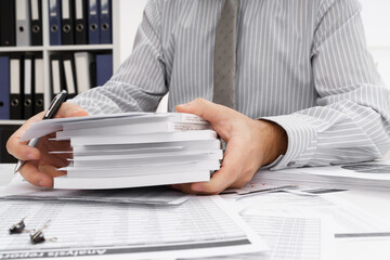 business concept - businessman's working table close view, checks financial reports, writes and counts