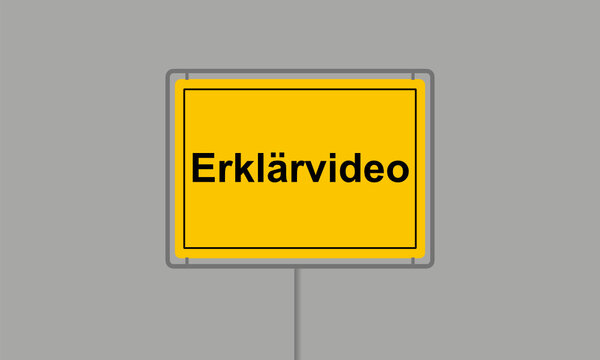 Gelbes Ortsschild mit dem Wort Erklärvideo vor grauem Hintergrund
