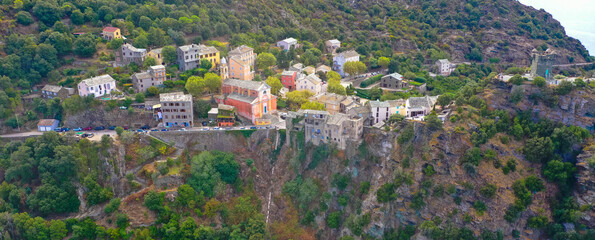 The medieval village of Nonza in Cap Corse is perched on a 100 meter high vertical cliff...