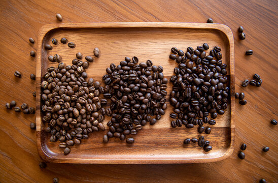 3 levels of roasted peaberry coffee beans are ready for brew drinking.