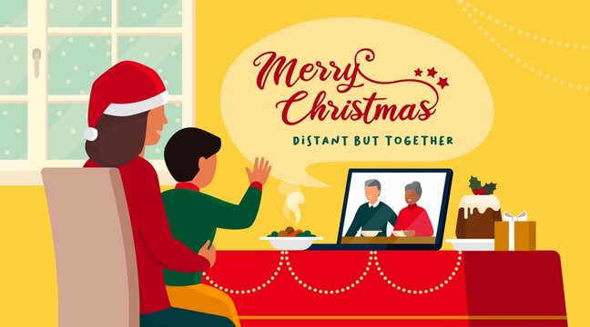 Families celebrating Christmas at home and connecting online on video call