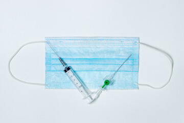 Medical devices on a white background. Medical concept. Blue medical mask