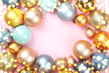 Fototapeta na wymiar Beautiful Christmas or New Year background with place for text on colored background top view with golden bokeh.