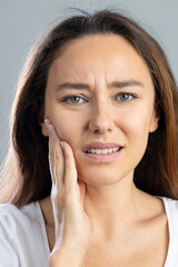 Young woman with toothache