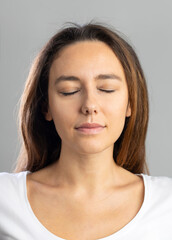 Young woman with calm facial expression