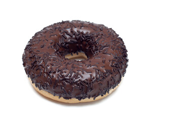 Chocolate donut with sprinkles, on a white background.