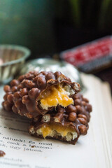 Coconut filling covered with milk chocolate