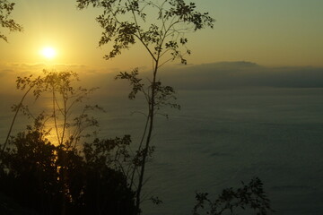 The sun sets in the sea, sunset in Crete.
