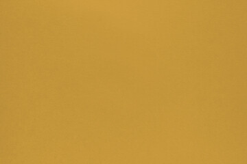 Abstract yellow background image. Blank textured paper.