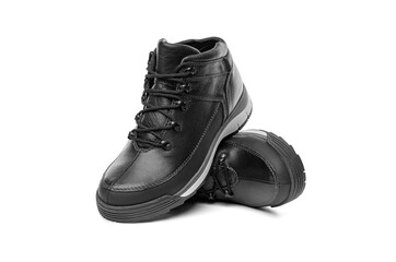 Black winter boots isolated on white background.