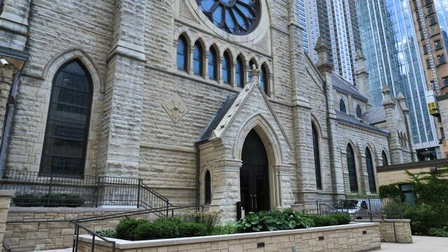 Holy Name Cathedral Exterior, Chicago USA. Catholic Landmark From 19th Century. Slow Motion Tilt Up