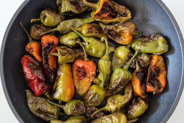 Padron peppers o Herbon peppers, typical spanish food, some are very pungent